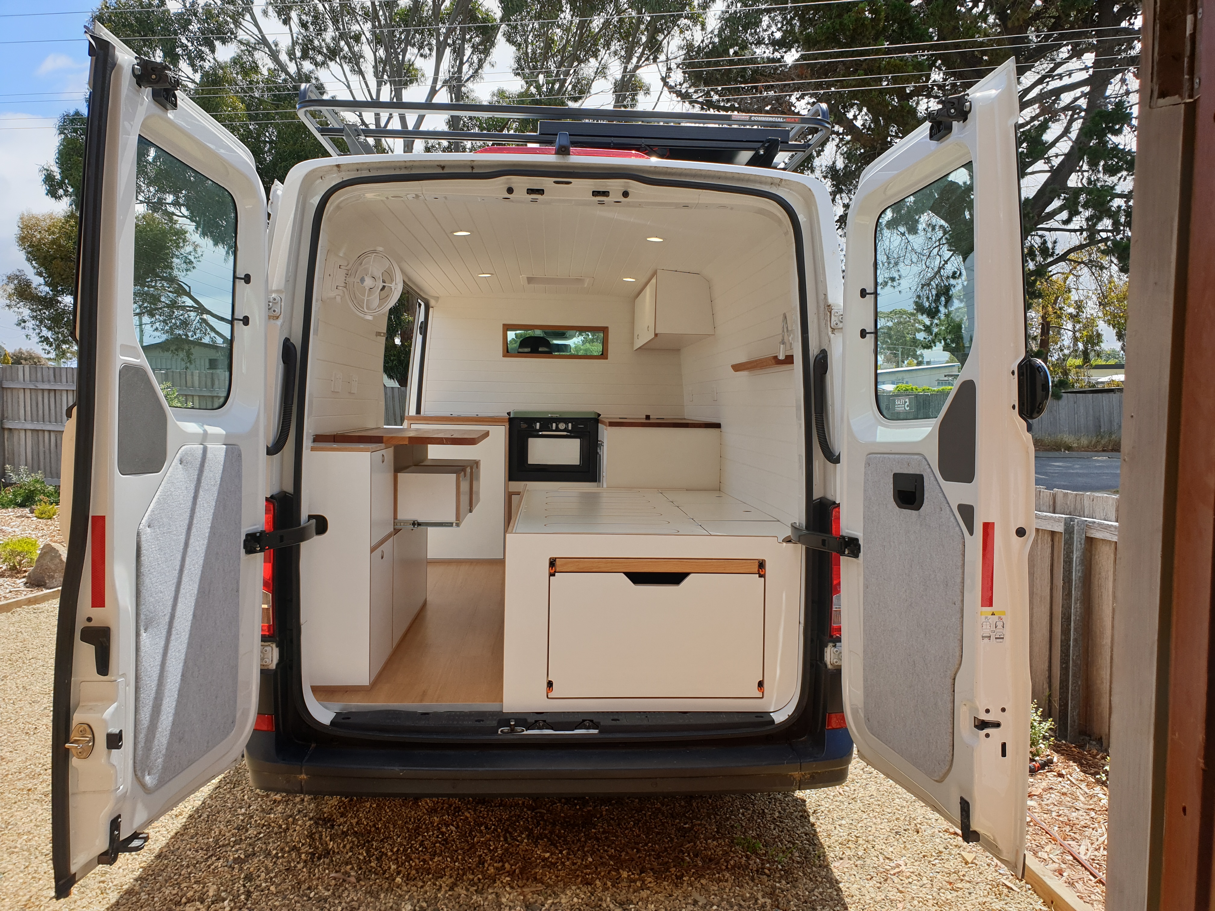 Custom campervan interior looking out to the landscape